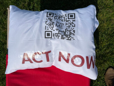 A QR Code that says Act Now